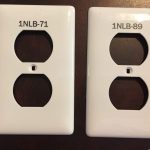 image of white engraved wall plug outlet electrical plates